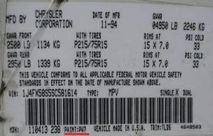 Chrysler and Dodge factory paint code label in the driver-side door jamb