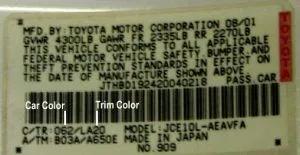 Toyota, Lexus, and Scion factory paint code label in the driver-side door jamb
