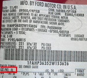 Ford factory paint code on the driver-side door-jamb certification label