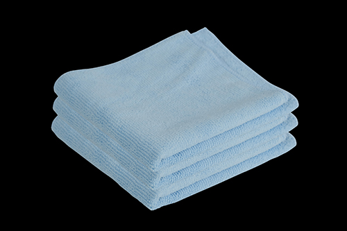 Clean microfiber cloth used to prepare a vehicle panel before paint chip repair